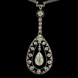 Fine Edwardian pendant with pear shaped diamond centre circa 1910 | BADA