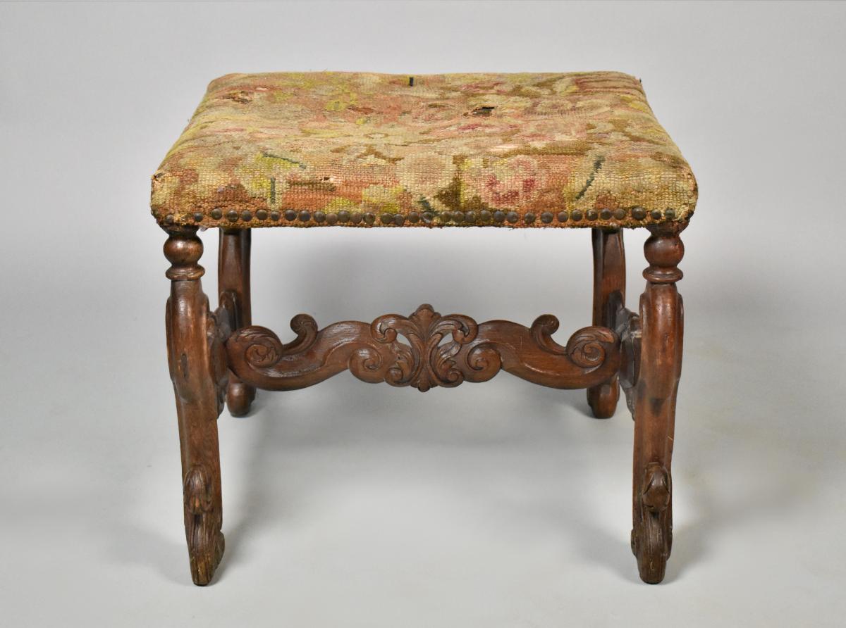 A rare pair of William and Mary oak stools with needlework covers, c.1690
