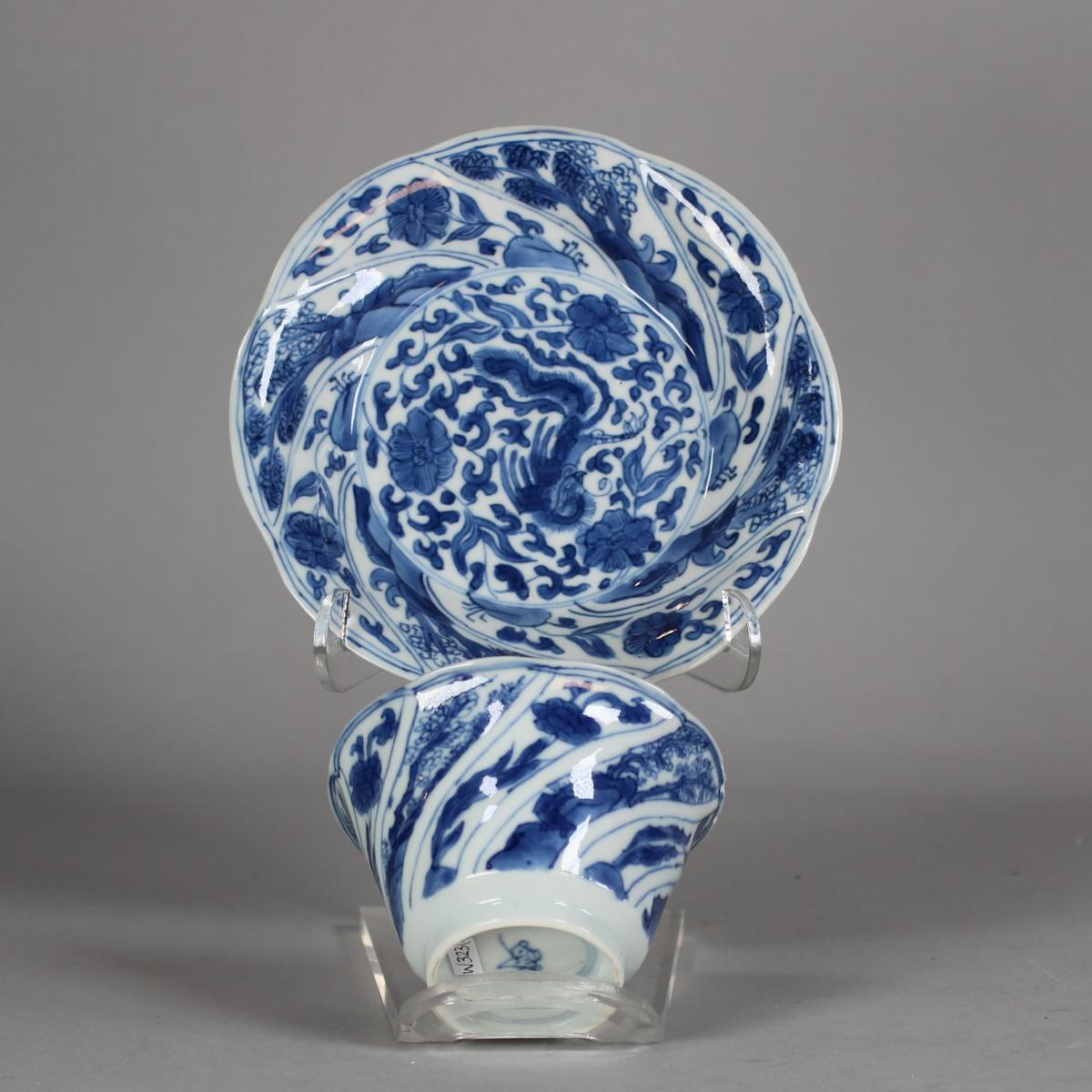 Chinese blue and white moulded teabowl and saucer, Kangxi (1662-1722)