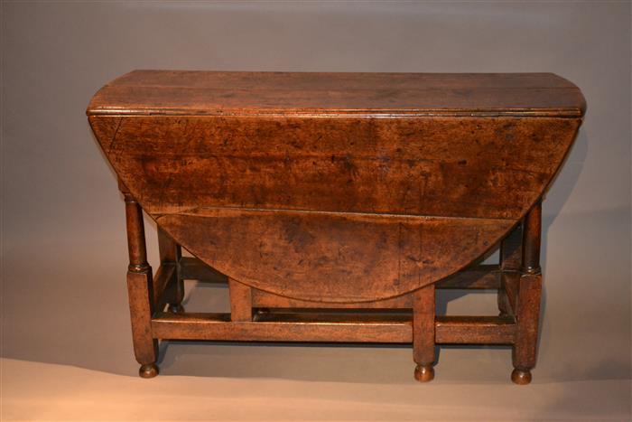 A Queen Anne walnut gateleg table