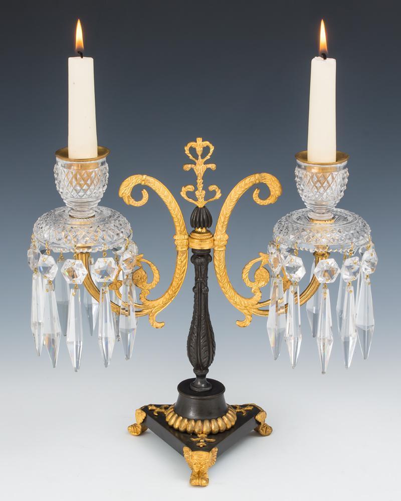 A Pair of Regency Ormolu and Bronze Cut Glass Candelabra