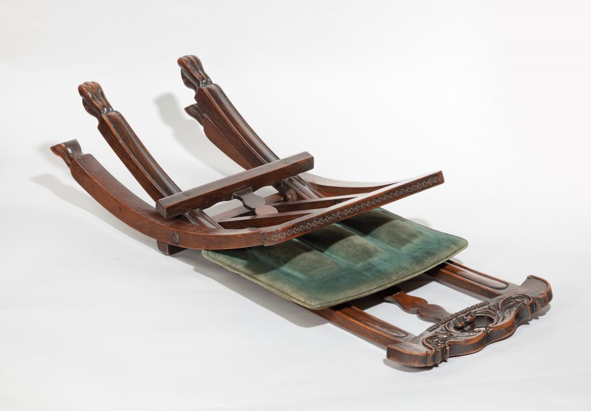 19th Century Folding Chair carved “Guicowar Hiwalee”