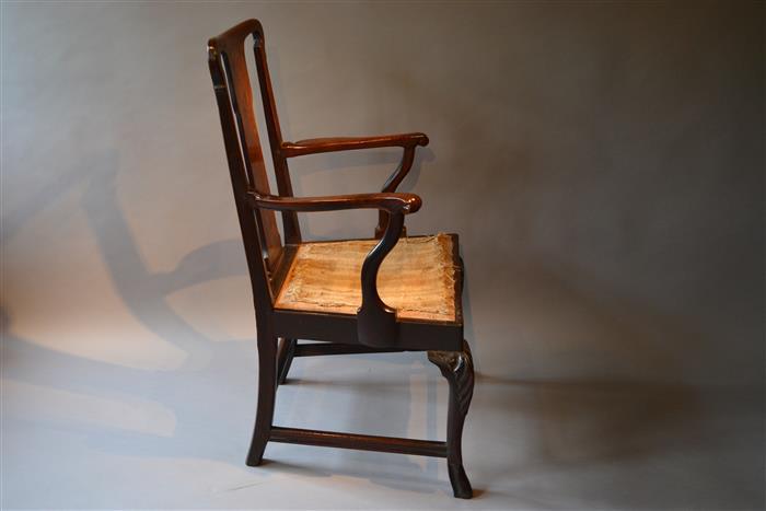 An unusual George II walnut armchair