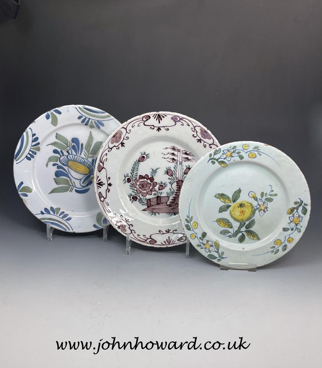 Three English delftware plates 18th century