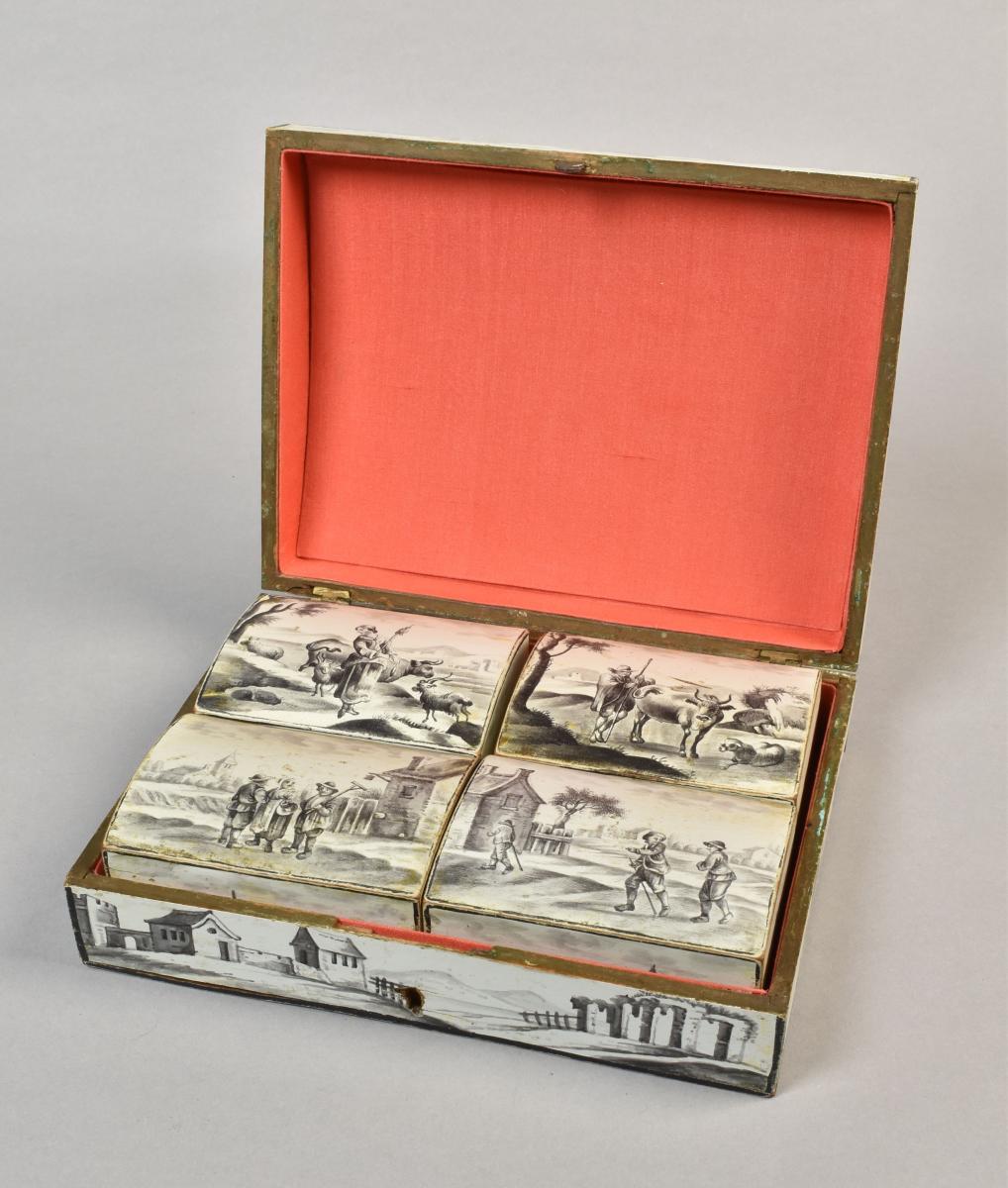 A fine Spa box containing a set of four smaller boxes, all decorated en grisaille, c.1780