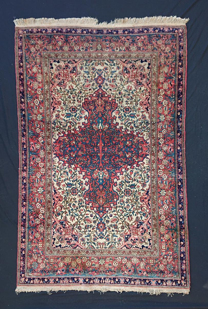 Persian Isfahan carpet on a white ground