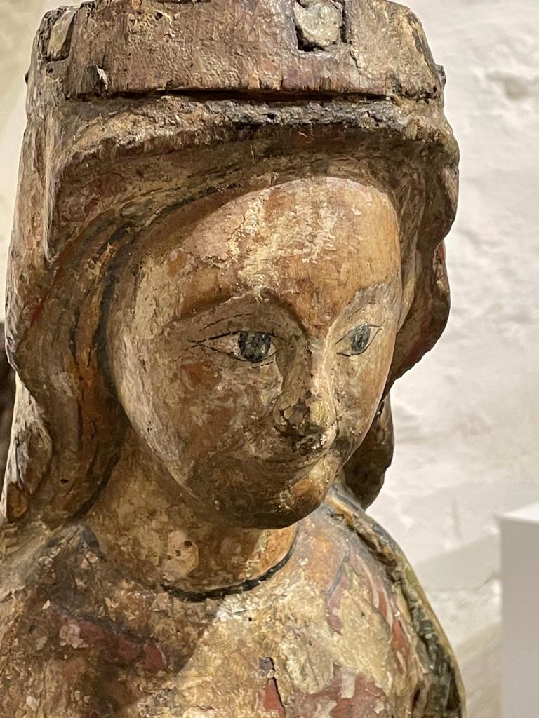 A Beautiful and Rare Early 14th Century Romanesque Carved and Polychromed Sedes Sepientiae. Circa 1320.