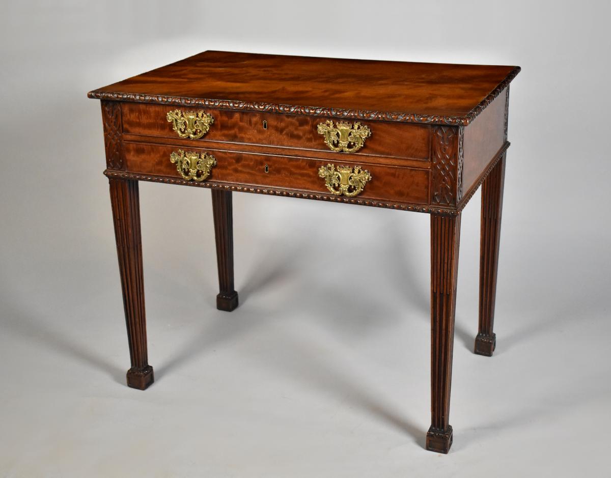 Chippendale period mahogany writing table with original gilt brass handles, c.1780
