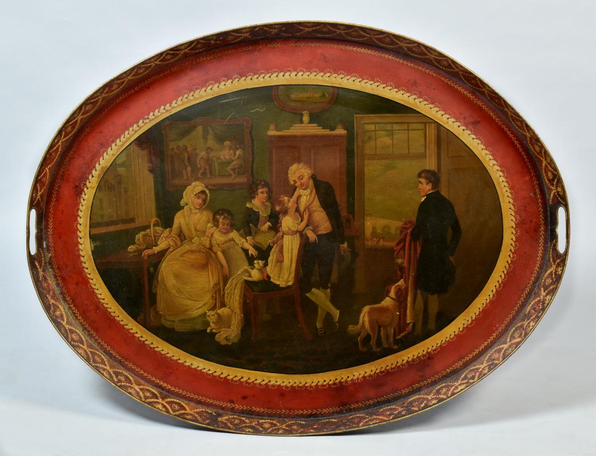 A near pair of Pontypool or Wolverhampton red ground oval trays on later painted stands, c.1790