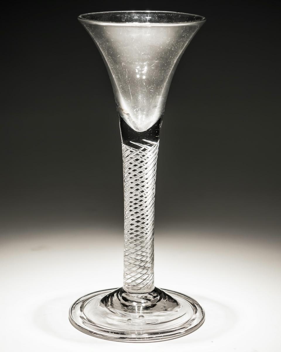 An air twist wine glass with folded foot