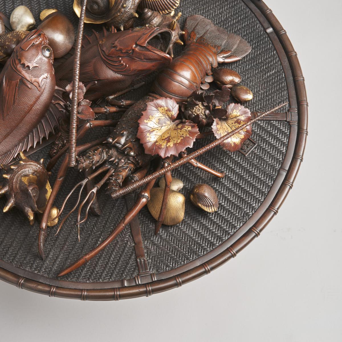 An elaborate Japanese, Meiji-era bronze and multi-metal basket of seafood Signed Joun