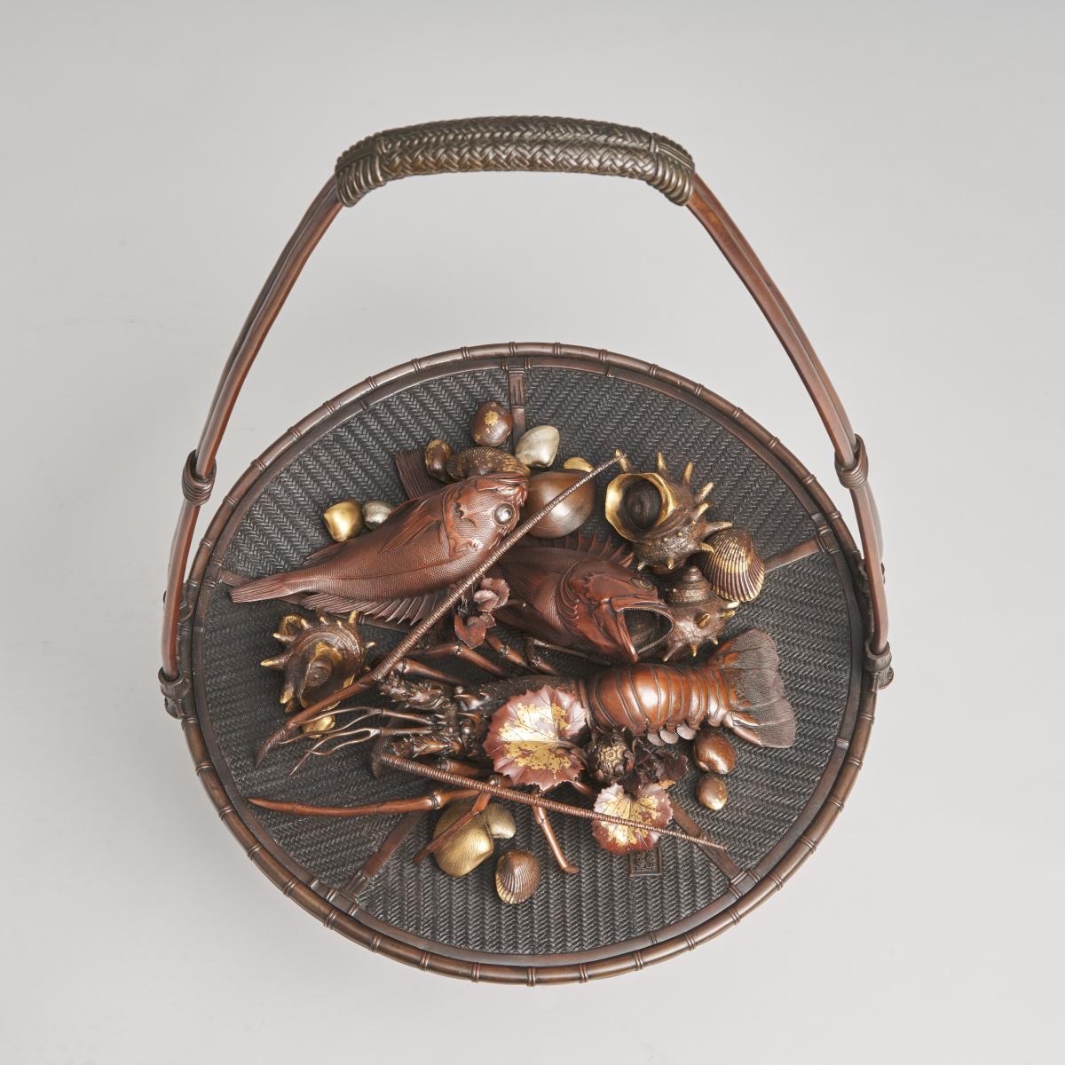 An elaborate Japanese, Meiji-era bronze and multi-metal basket of seafood Signed Joun