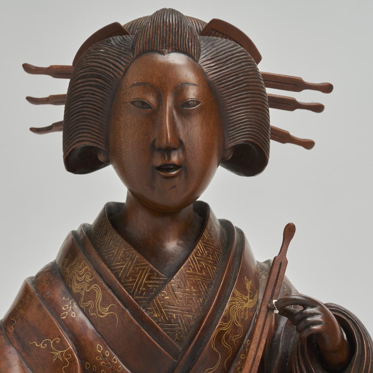 A pair of very finely carved Japanese wood figures (1868-1912)