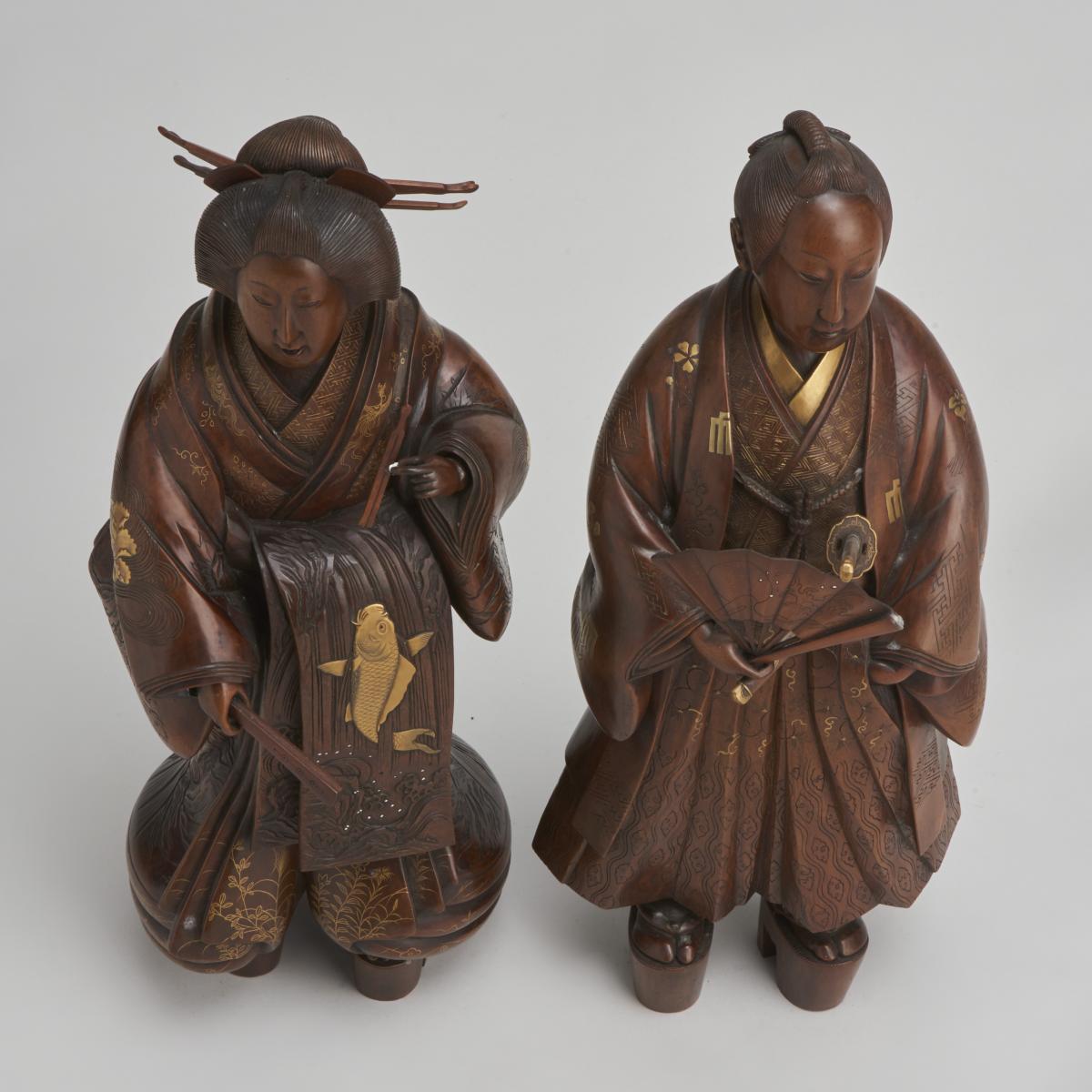 A pair of very finely carved Japanese wood figures (1868-1912)