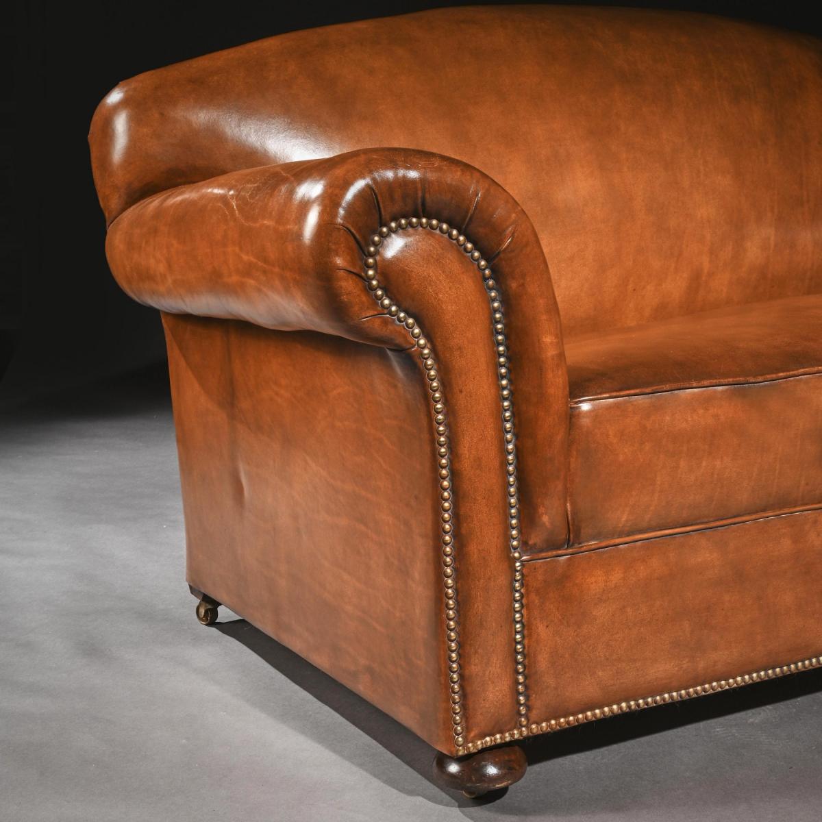 Late 19th Century Victorian Leather Upholstered Drop-Arm Sofa