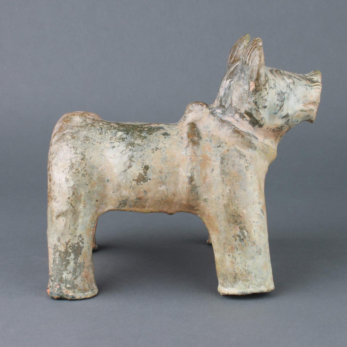 A Chinese green lead glazed standing figure of a dog, Han Dynasty, 206BC-220AD