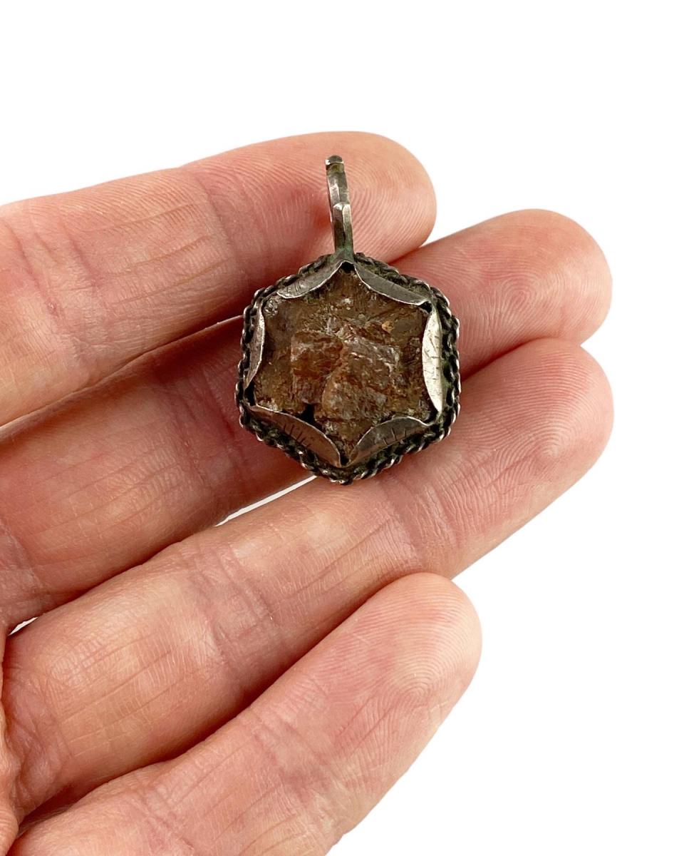 Silver mounted Aragonite amuletic pendant. Spain, 17th century