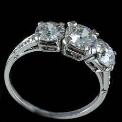 Platinum set three stone diamond ring