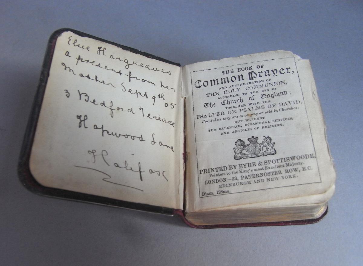 A rare silver mounted miniature book of the Common Prayer.  The silver cover made in Birmingham in 1902