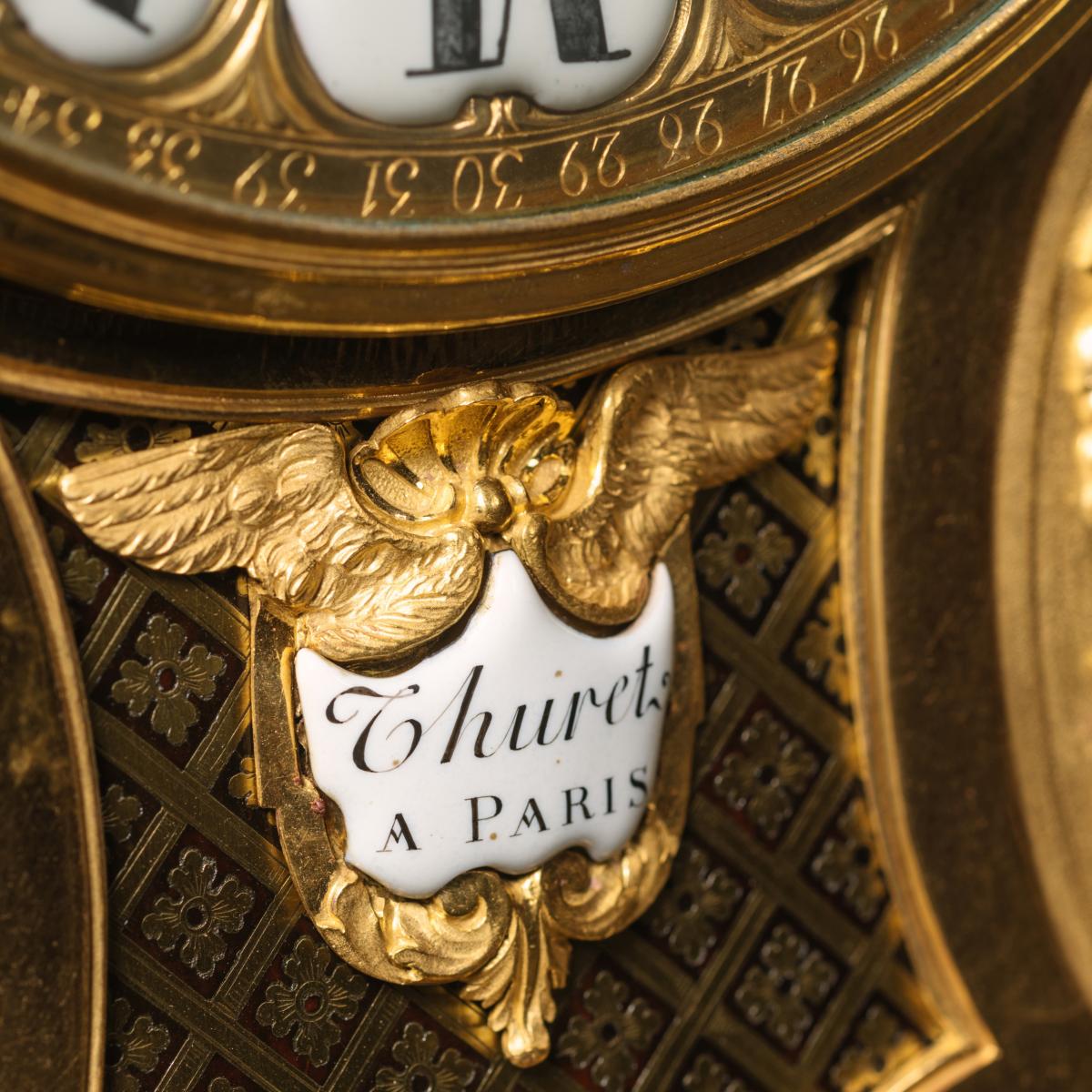 Cartel clock detail 