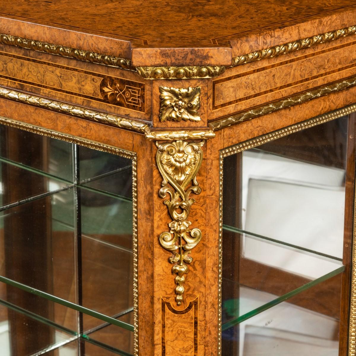 A mid Victorian burr walnut display cabinet
