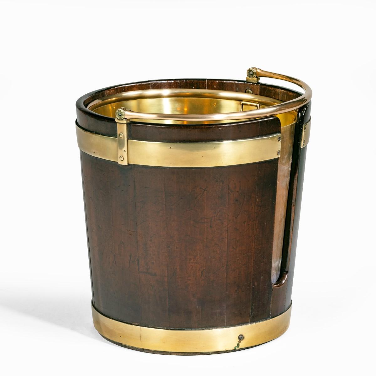  A George III mahogany and brass-bound plate bucket