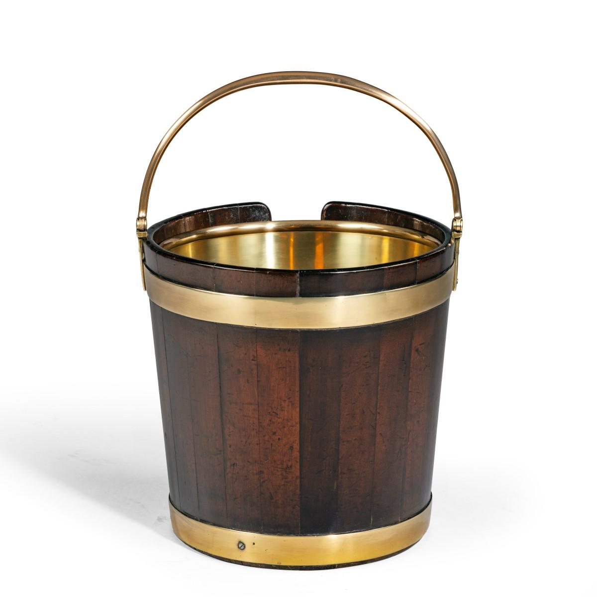  A George III mahogany and brass-bound plate bucket