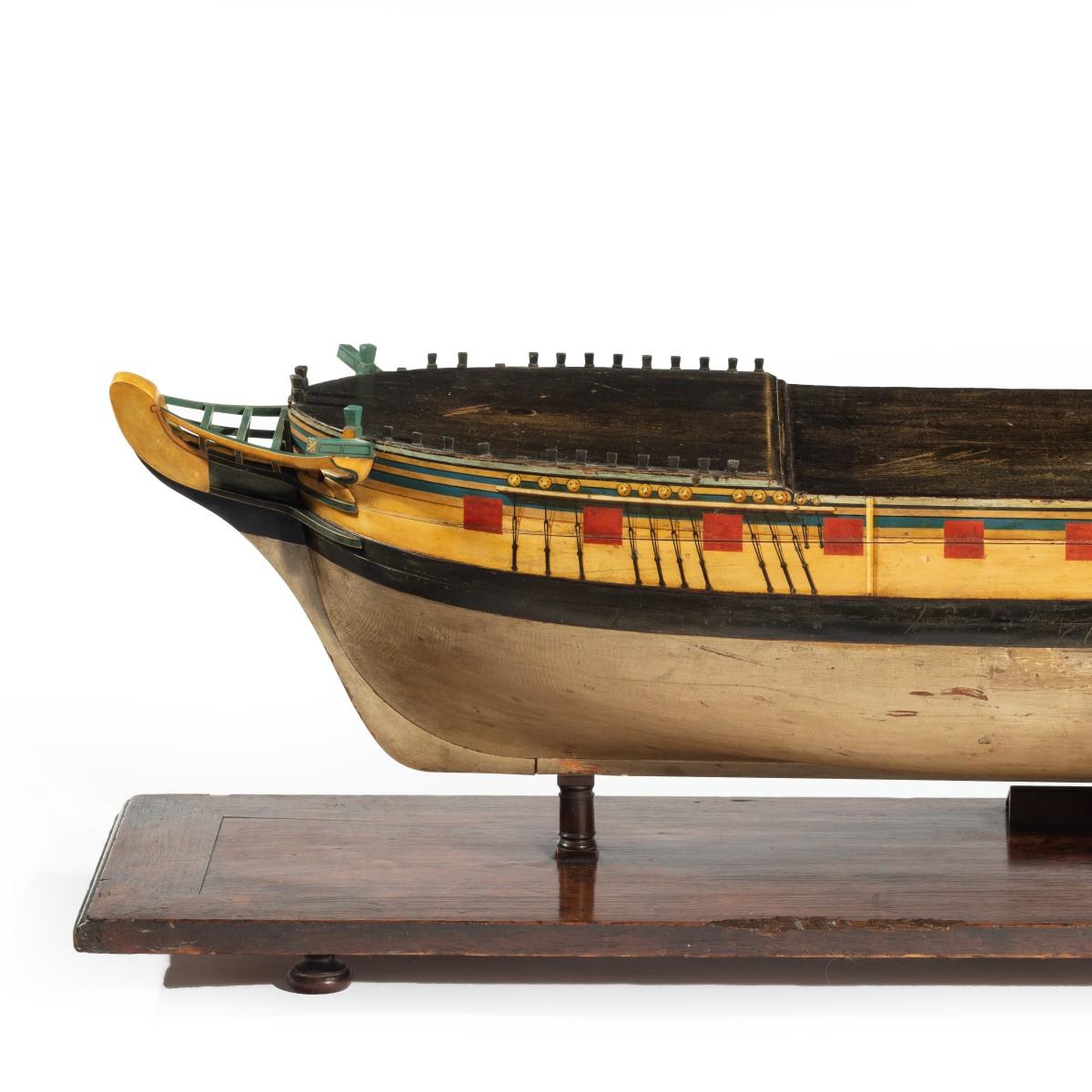 A carved and painted model of HMS Emerald, 1811 and ‘HMS Emerald and HMS Amethyst’ by Pocock