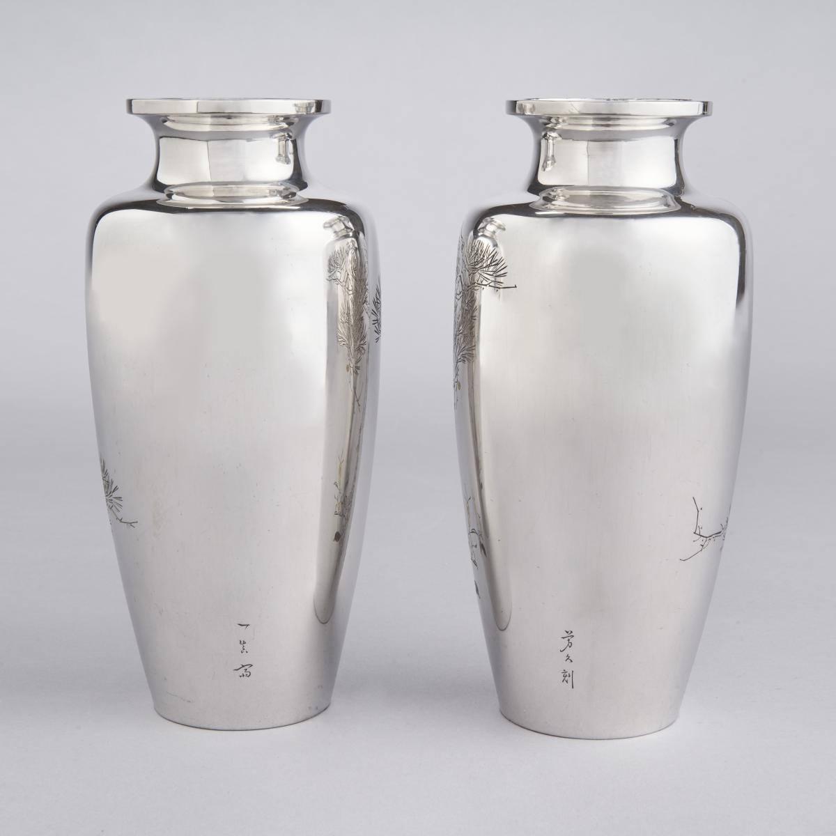Japanese pair of silver vases with birds, signed Isshinsai Yoshihisa koku with seal of the Shobido Studio and Jungin mark, Meiji Period.