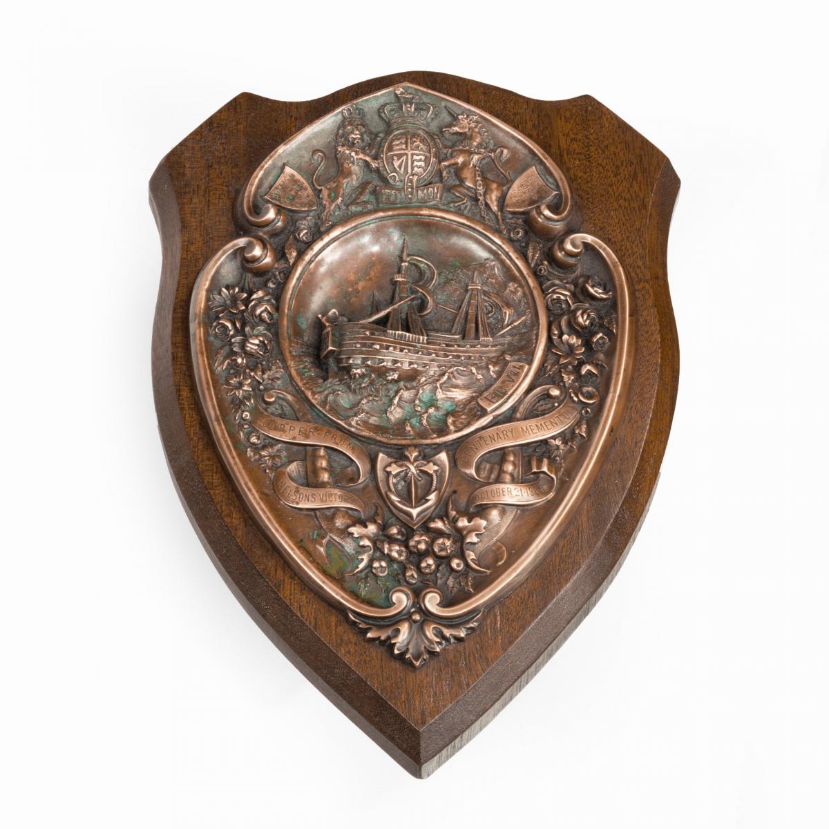 A HMS Victory centennial copper shield