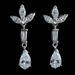 Diamond pear shaped drop earrings, circa 1960 | BADA
