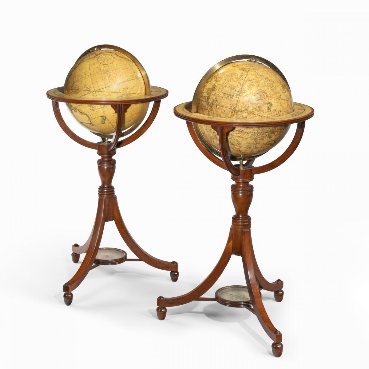 A pair of 12-inch floor globes by Cary