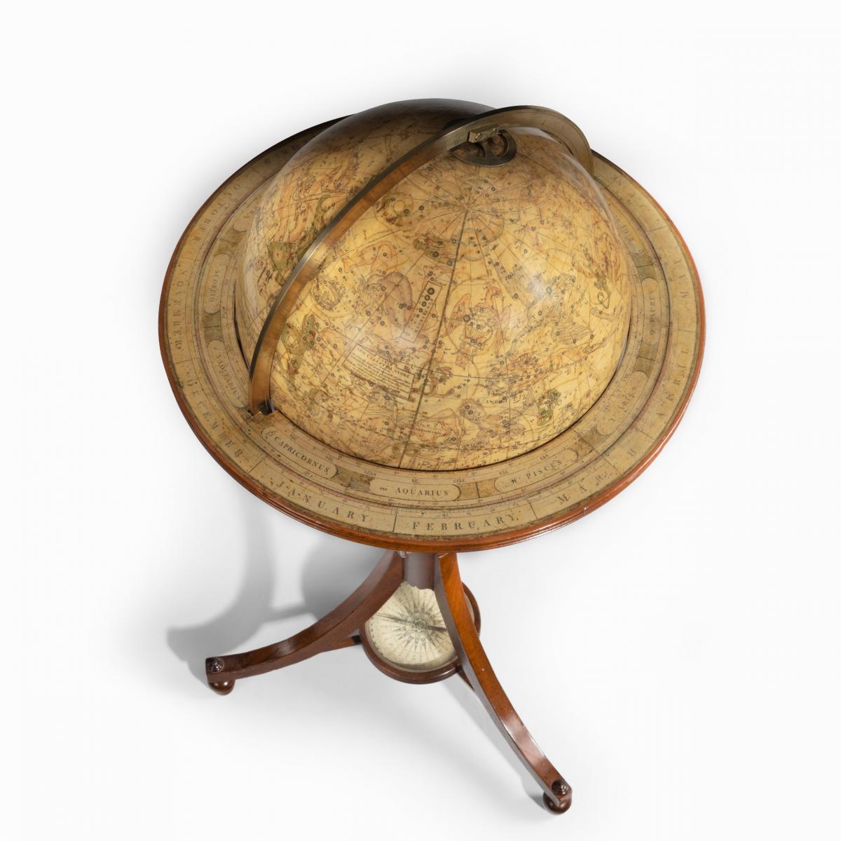 A pair of 12-inch floor globes by Cary