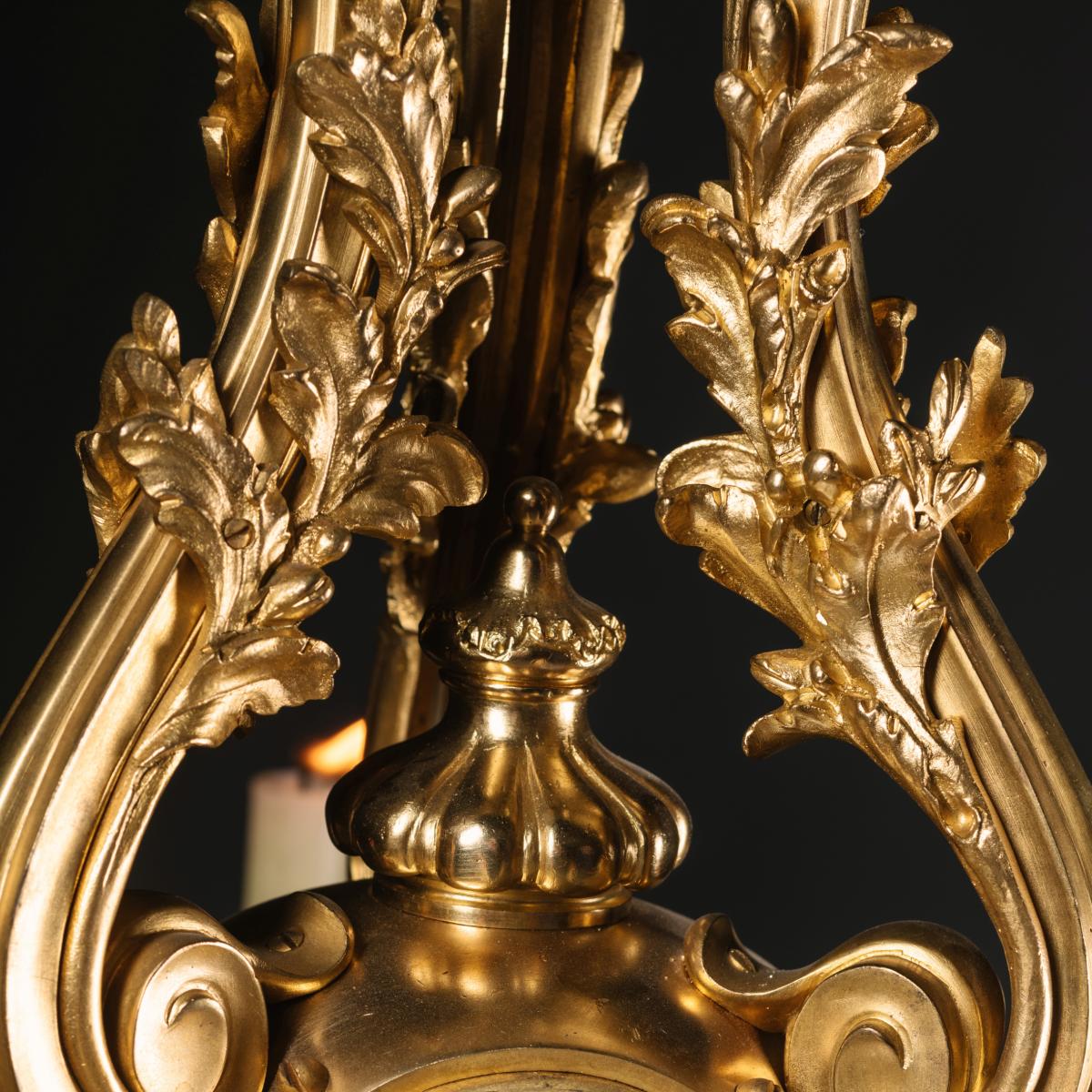 A Fine Louis XV Style Gilt-Bronze Nine-Light Chandelier.