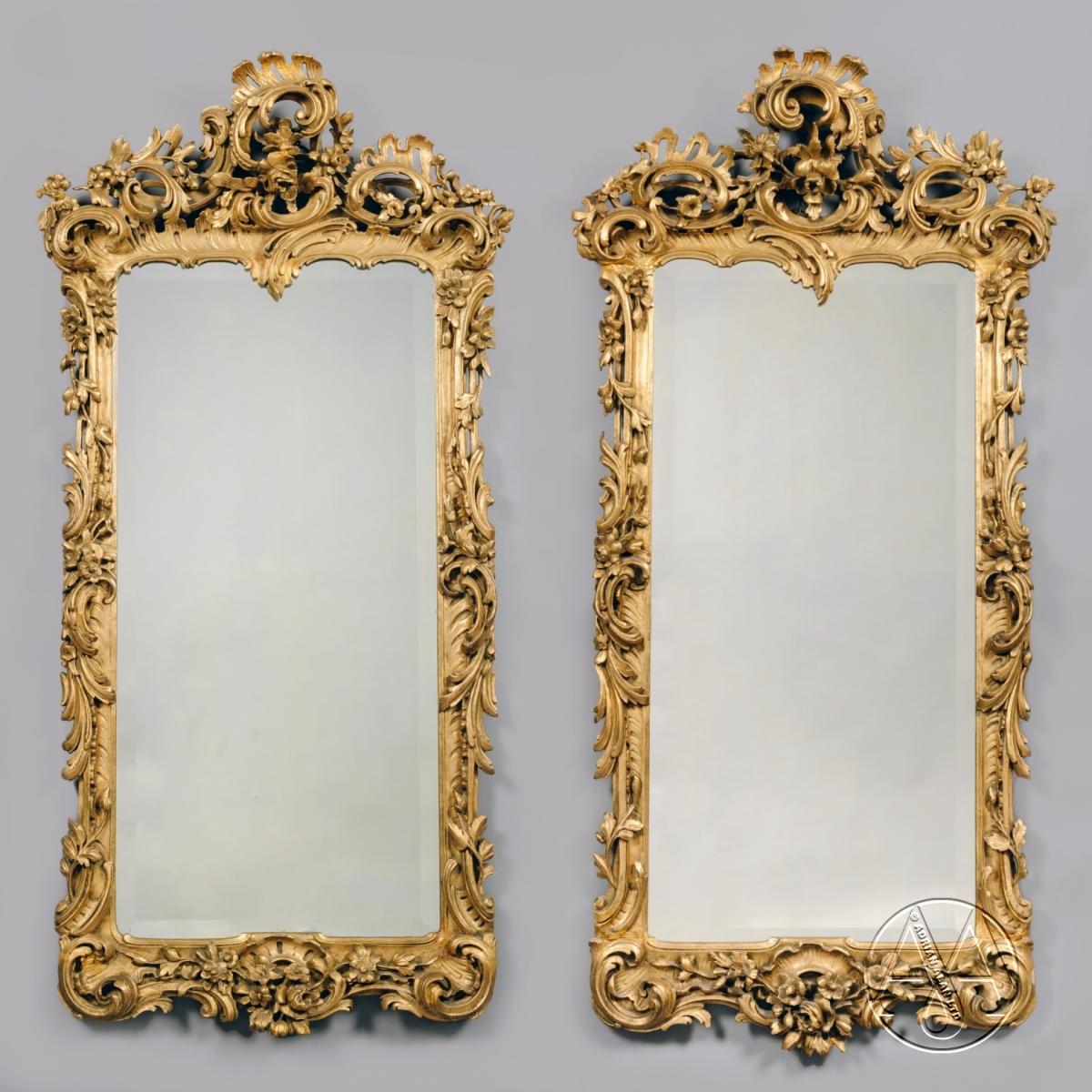 A Fine Pair of George III Style Giltwood Mirrors