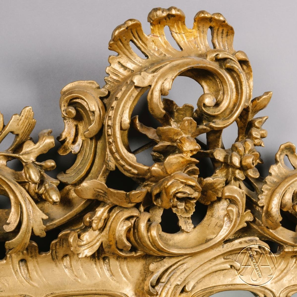A Fine Pair of George III Style Giltwood Mirrors