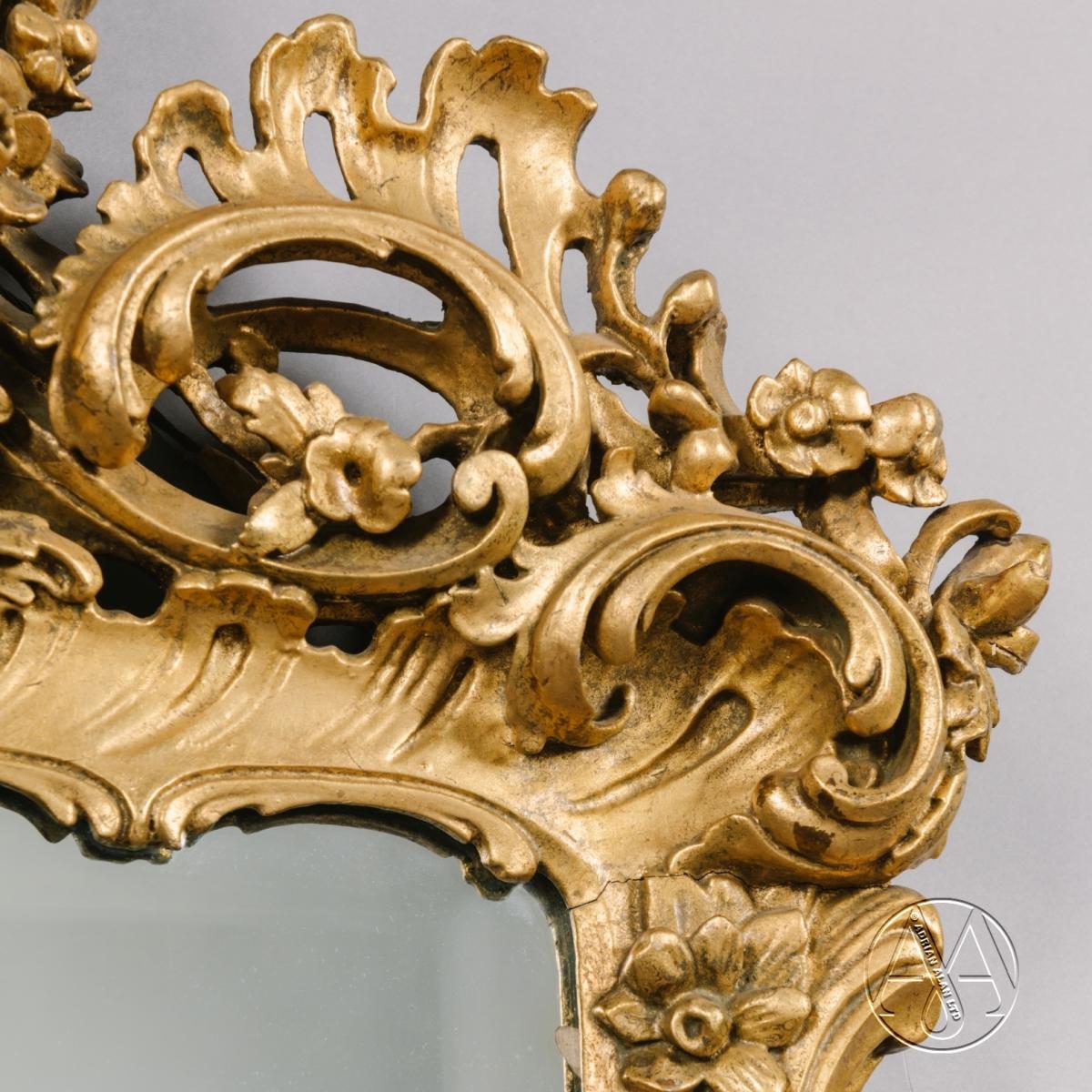 A Fine Pair of George III Style Giltwood Mirrors