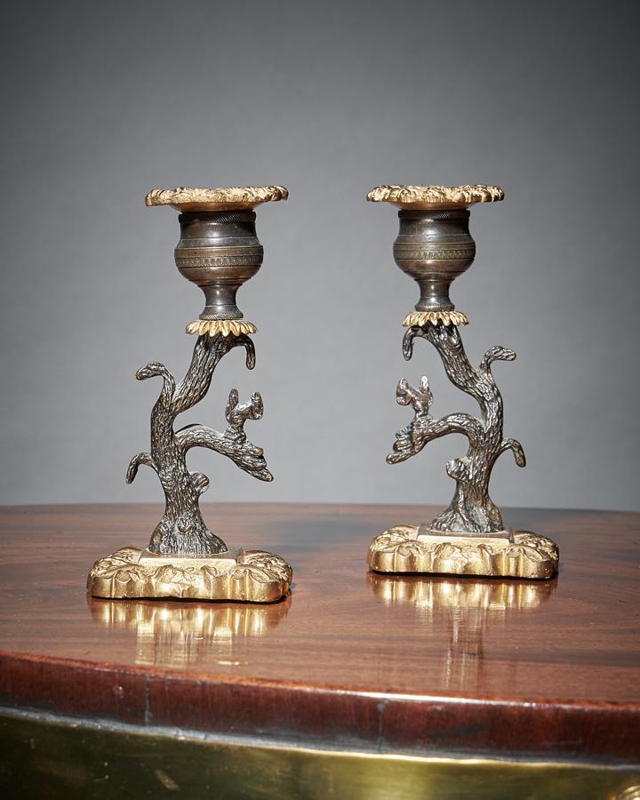 Regency period bronze and gilt candlesticks