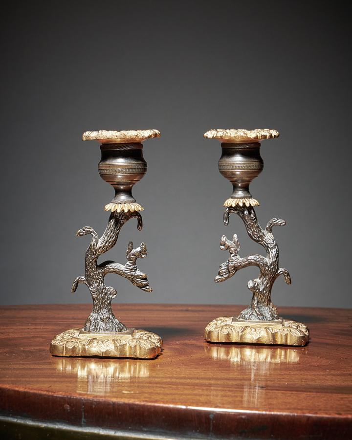 Regency period bronze and gilt candlesticks
