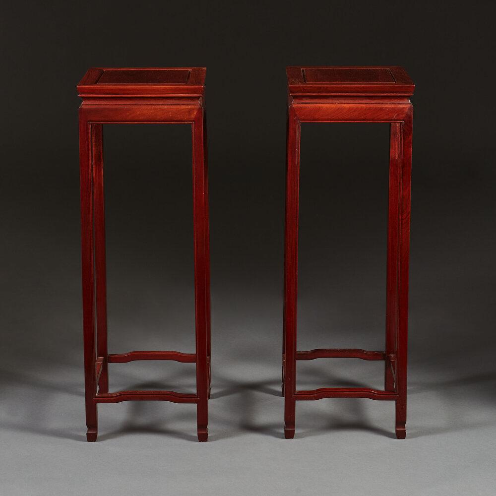 A Pair of Chinese Hardwood Pedestal Tables
