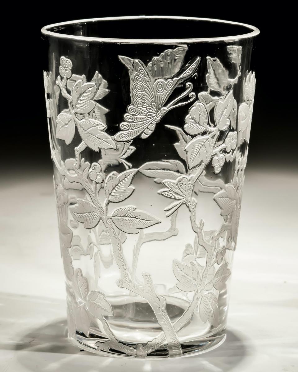 A Finely Decorated Decanter with Matching Tumblers