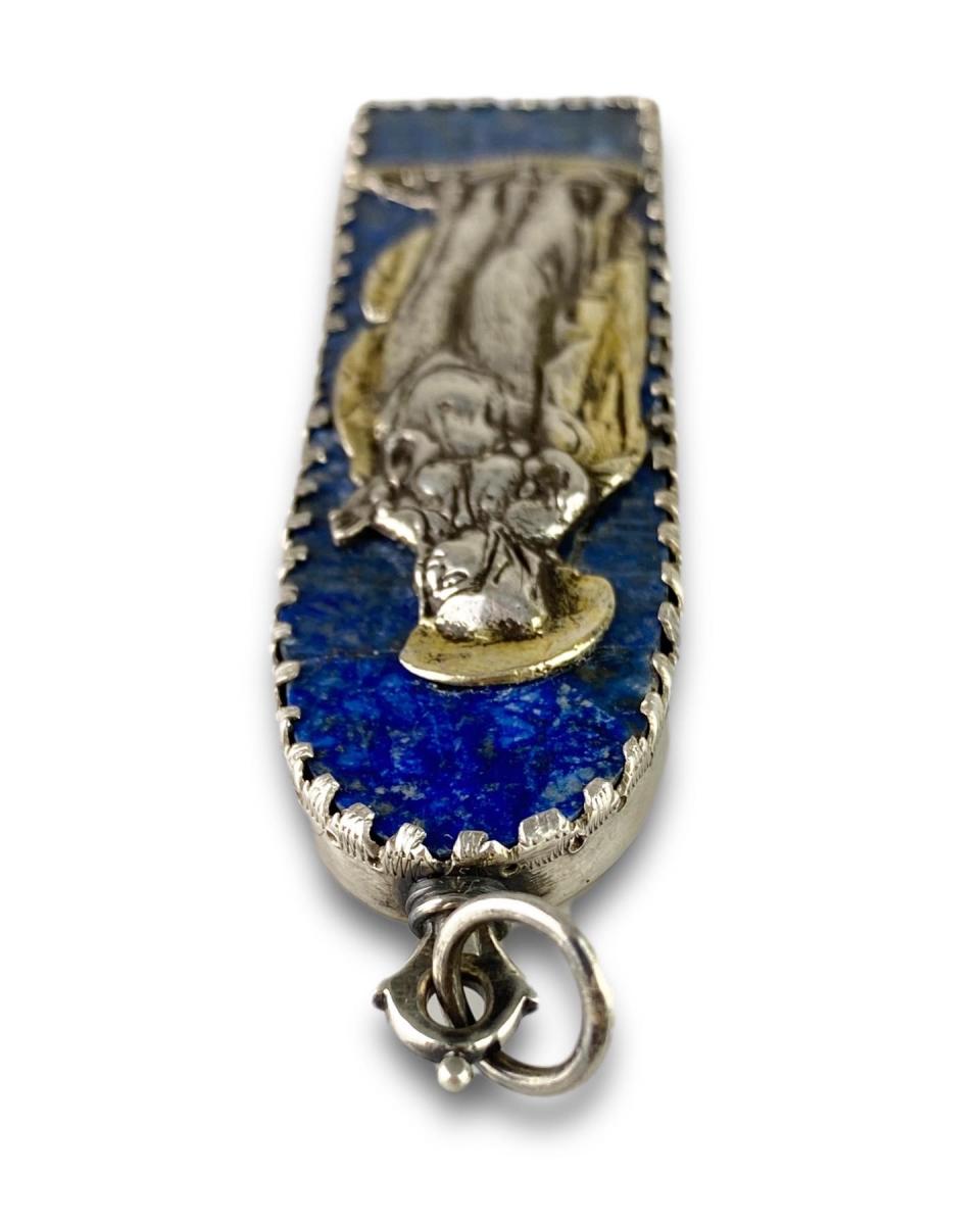 Silver devotional pendant set with lapis lazuli. Italian, 17th century
