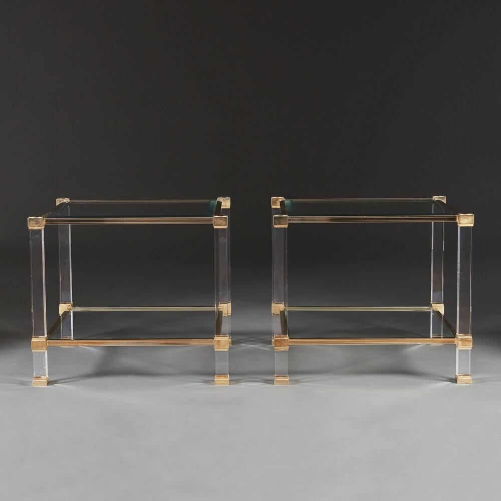 A Pair of Lucite and Brass Side Tables