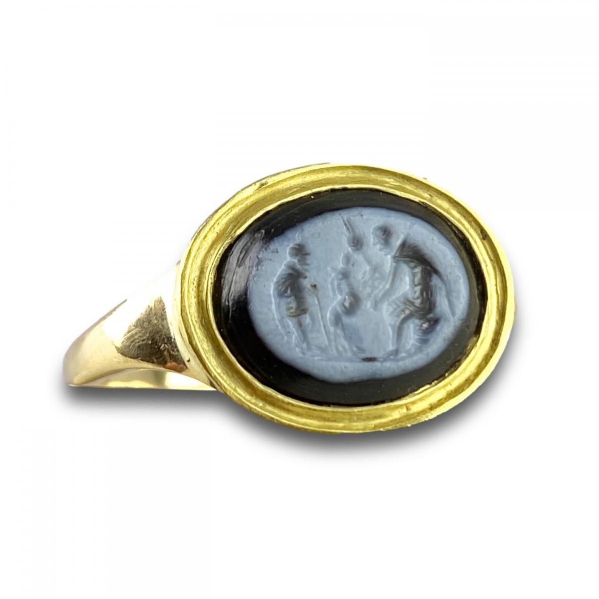 Ring set with a Roman Nicolo intaglio. 2nd century A.D, later gold ring