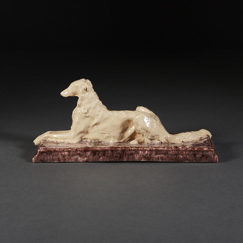 A Porcelain Borzoi Dog Sculpture