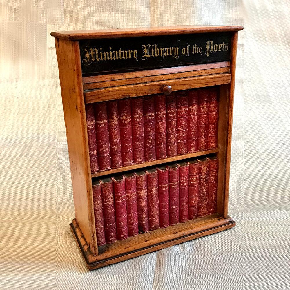 A Late 19th Century Oak Miniature Bookcase of Poetry