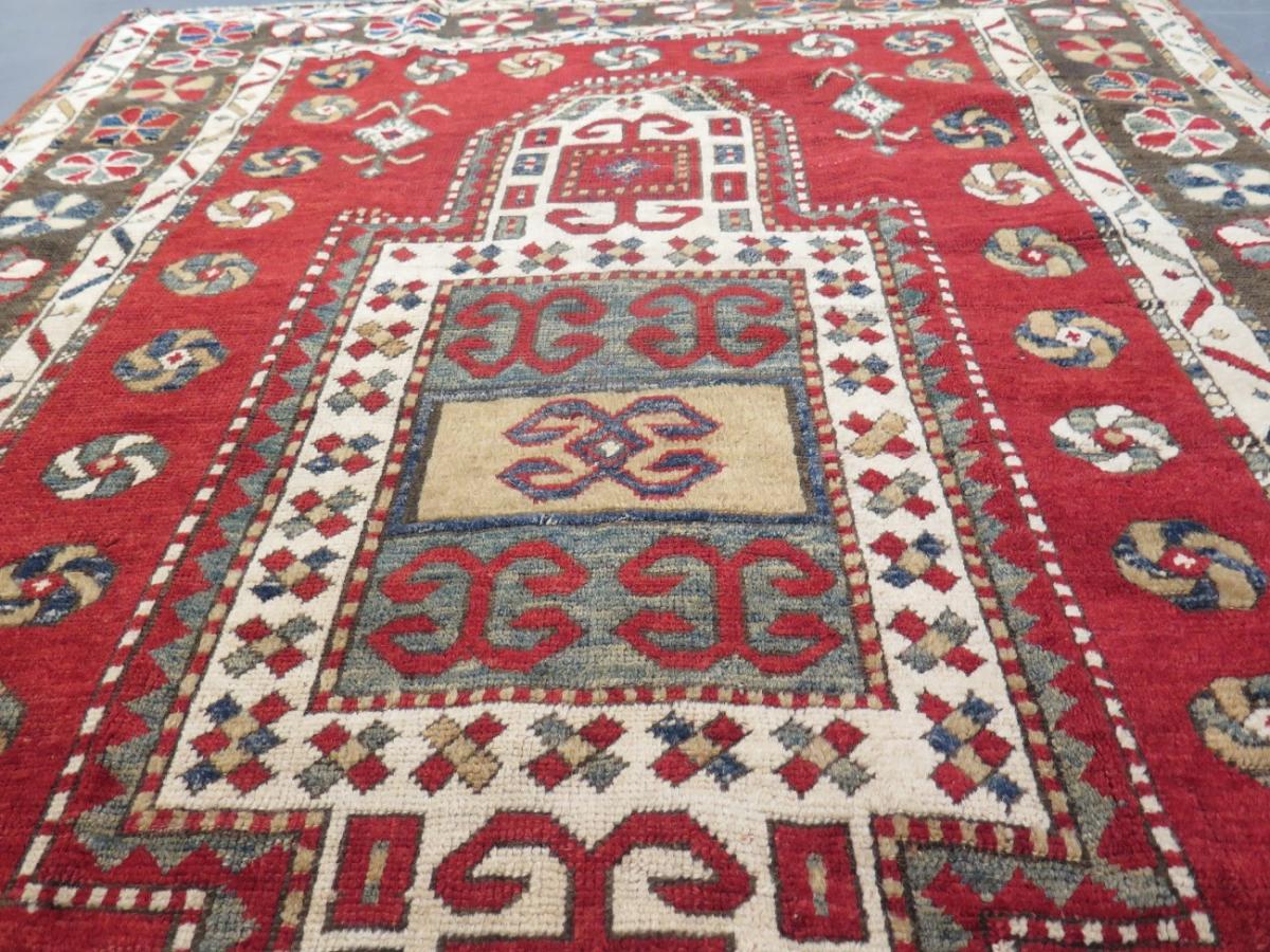Antique Kazak rug