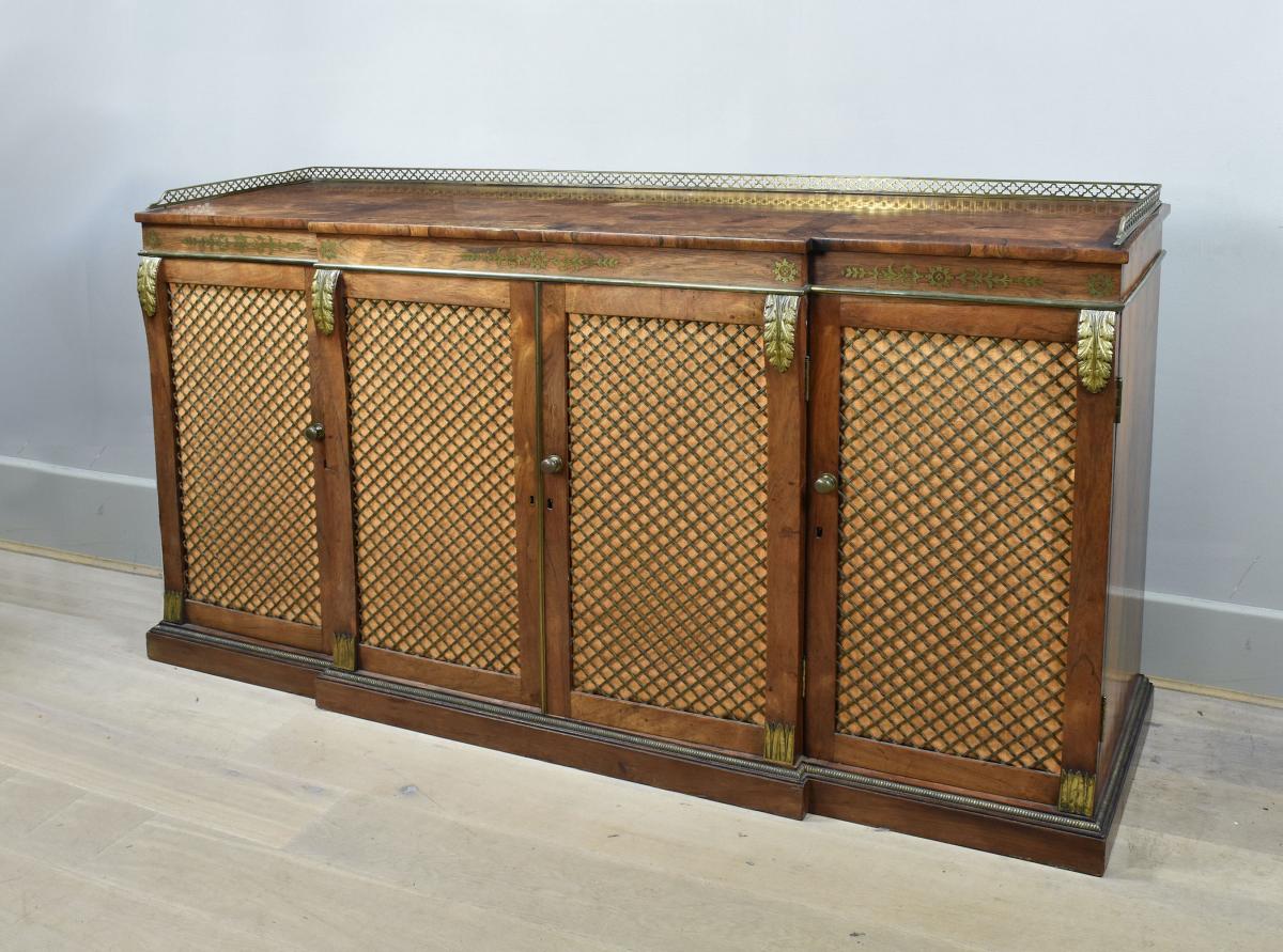 A fine Regency brass inlaid rosewood breakfront cabinet with gilt bronze mounts, c.1810