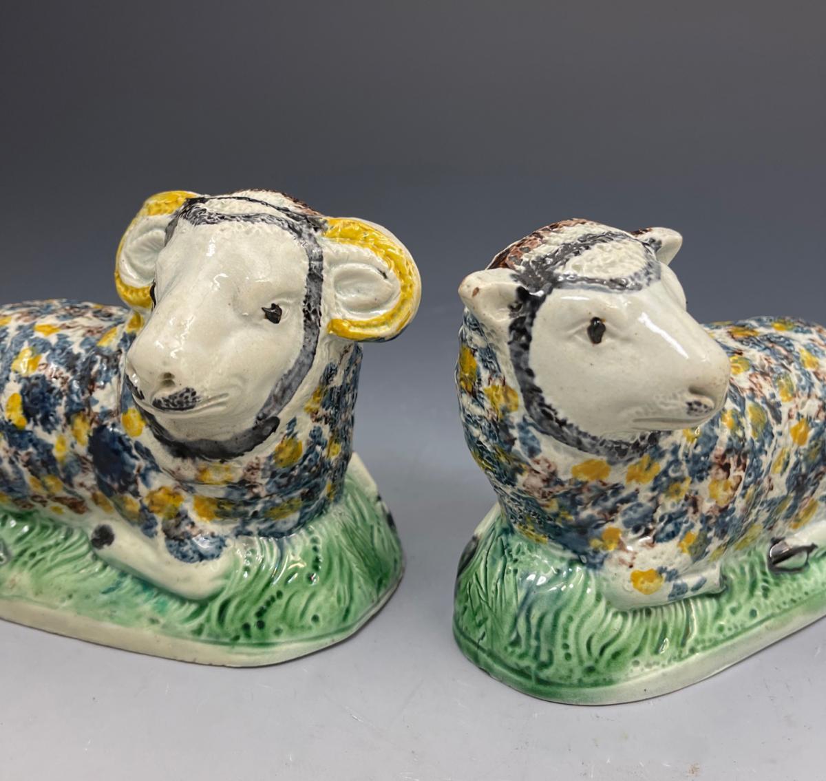Pair of pottery figures a Ram and Ewe underglaze oxide decoration late 18th century