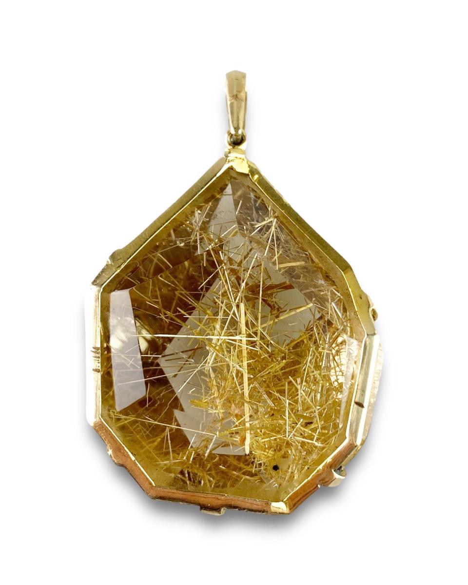 Faceted rutilated quartz pendant. English, 1970’s